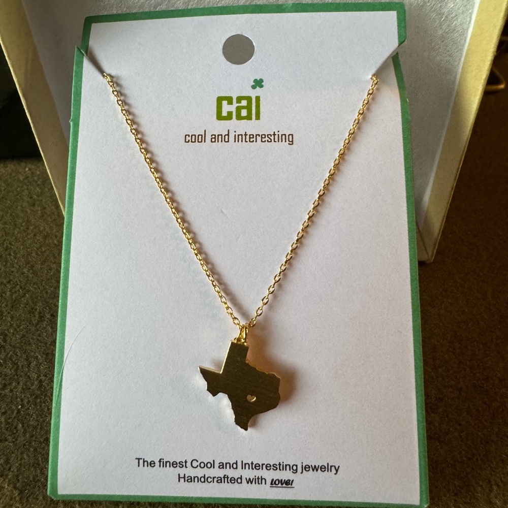 Cool and Interesting Gold Texas state necklace.  Super cute!  16” length.